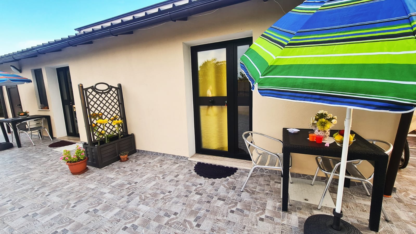 Veranda con ombrellone